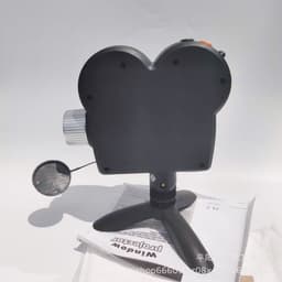 image-CX Window Projector Light with Interchangeable Holiday Designs
