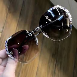 image-Women's Retro Round Sunglasses UV Protection PC Frame Resin Lens