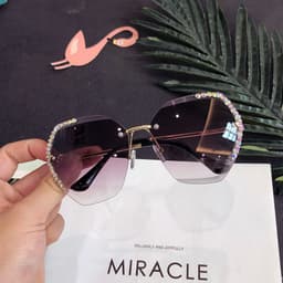 image-Women's Retro Round Sunglasses UV Protection PC Frame Resin Lens