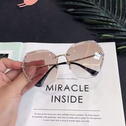 image-Women's Retro Round Sunglasses UV Protection PC Frame Resin Lens