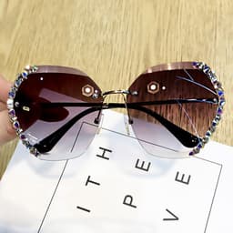image-Women's Retro Round Sunglasses UV Protection PC Frame Resin Lens
