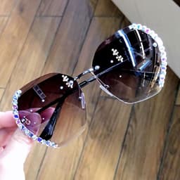 image-Women's Retro Round Sunglasses UV Protection PC Frame Resin Lens