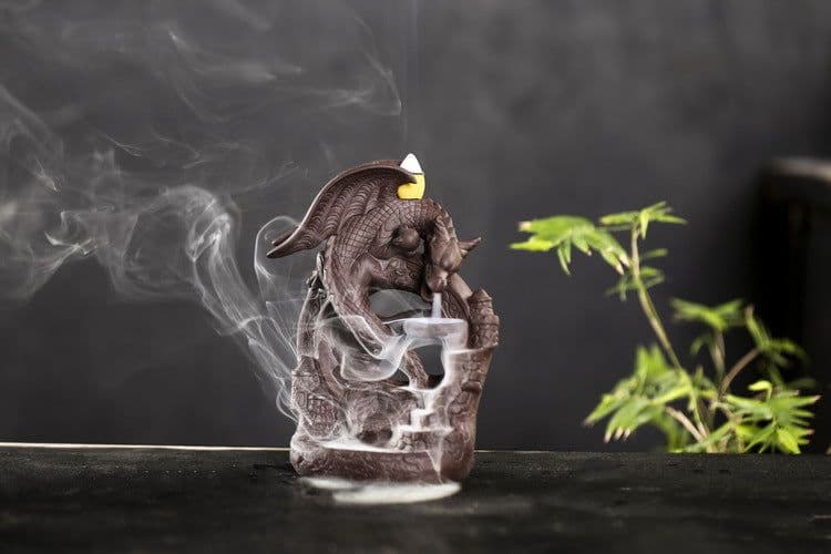 image-Ceramic Dragon Dinosaur Incense Burner with Fog Effect