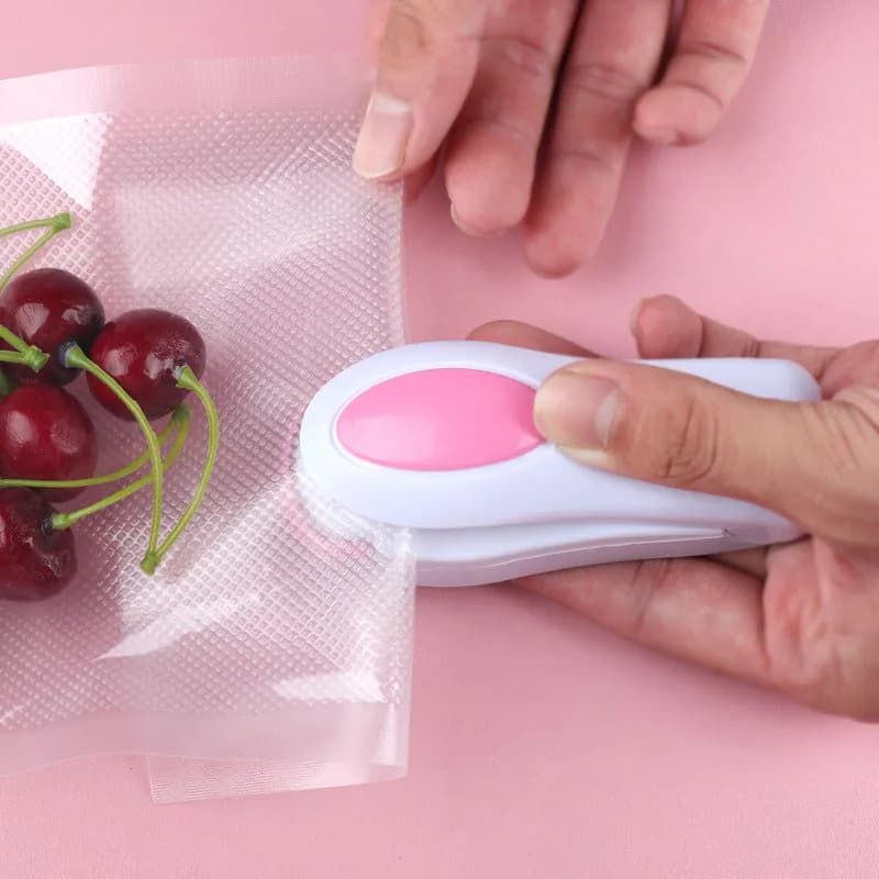 image-Vibrato Mini Portable Handheld Vacuum Sealer Travel Snack Sealer