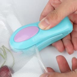image-Vibrato Mini Portable Handheld Vacuum Sealer Travel Snack Sealer