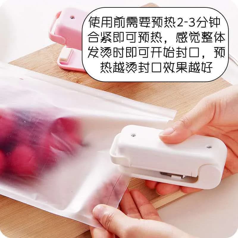 image-Portable Mini Heat Sealing Machine for Plastic Bags - Pink