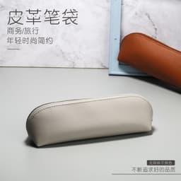 image-Curved Zipper Leather Pencil Case Waterproof Cosmetic Storage Bag