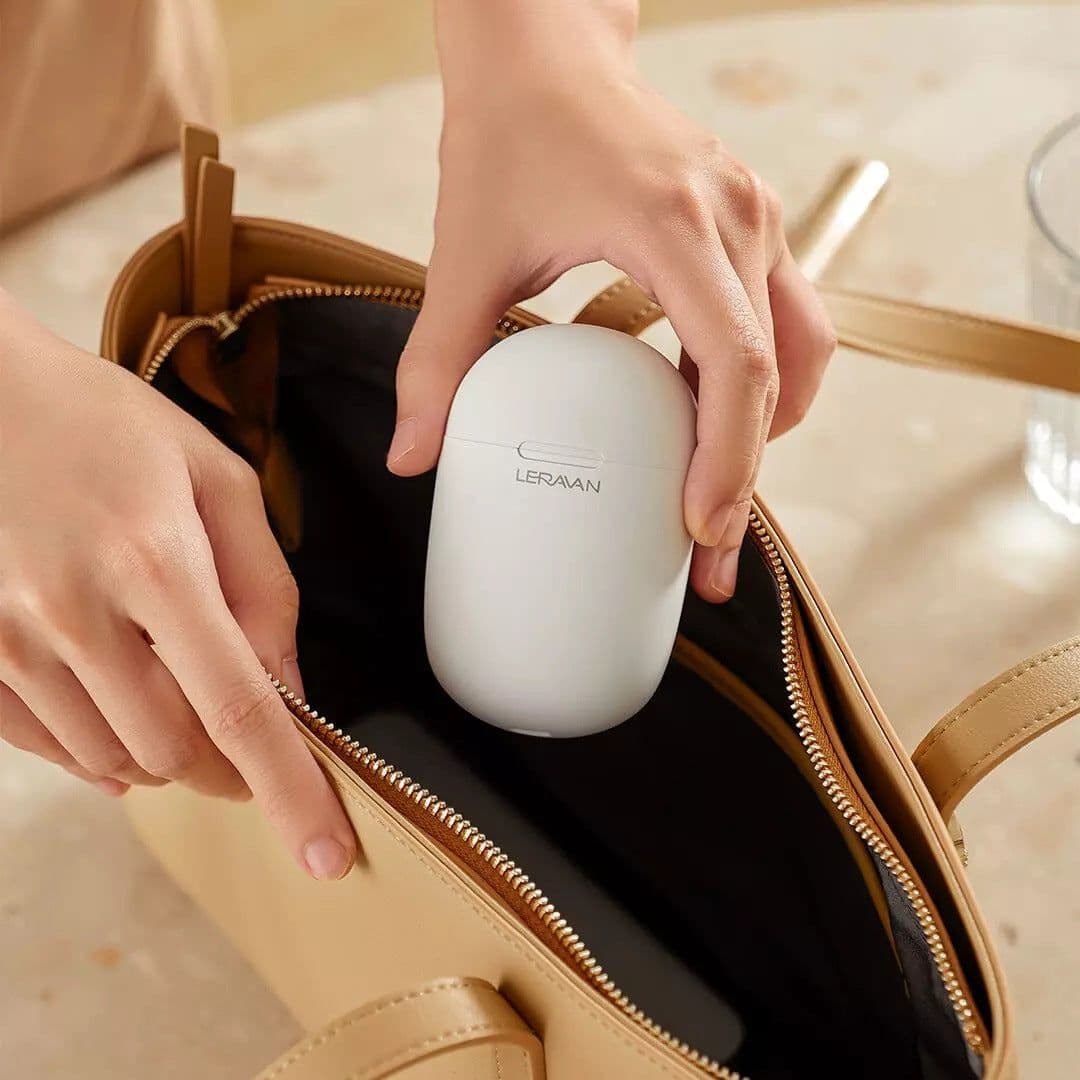 image-Le Fan LJ-U8 Mini Pulse Massager with USB Charging and 2 Pads