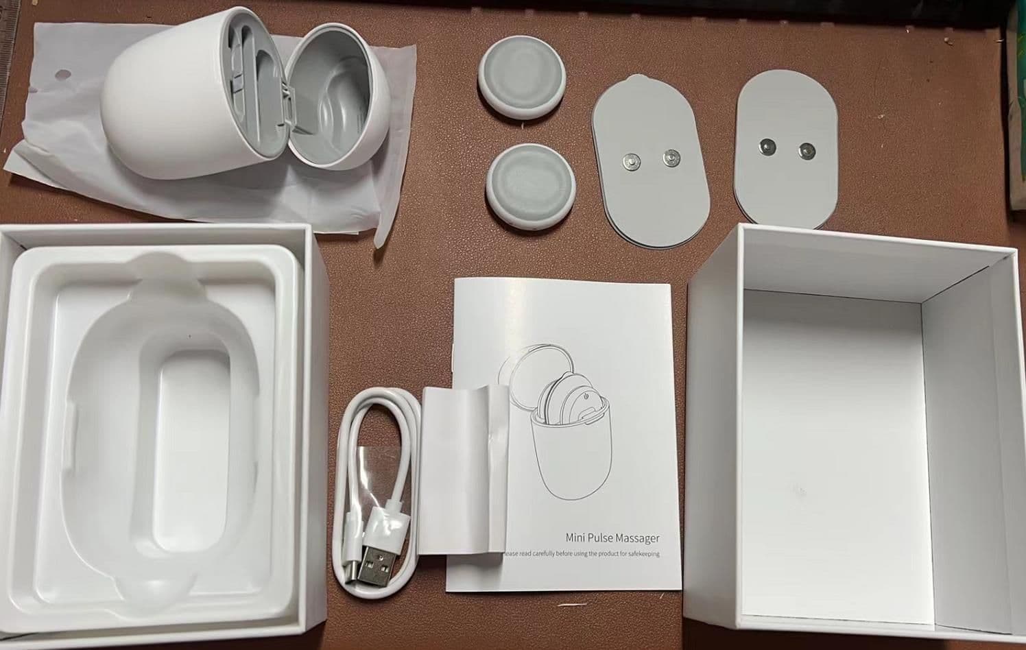 image-Le Fan LJ-U8 Mini Pulse Massager with USB Charging and 2 Pads