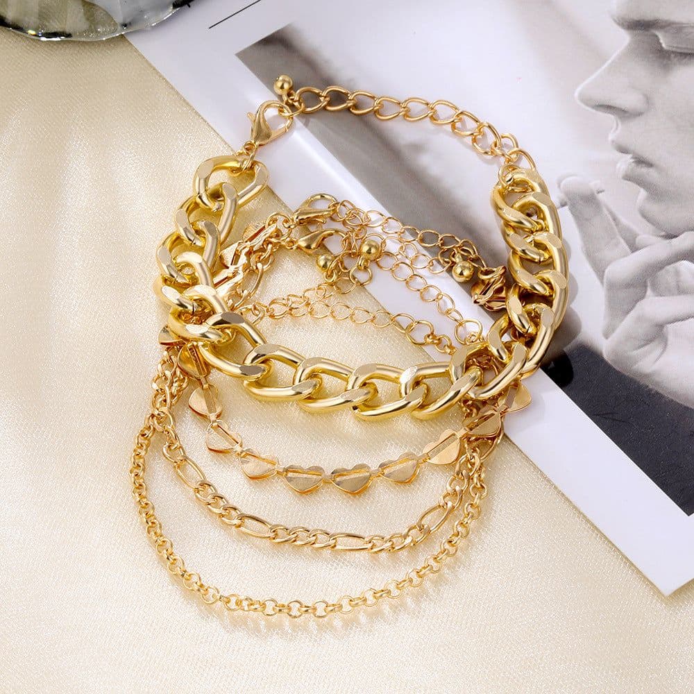 image-Korean Multi-Layer Tassel Hollow Heart Metal Bracelet 4-Piece Set