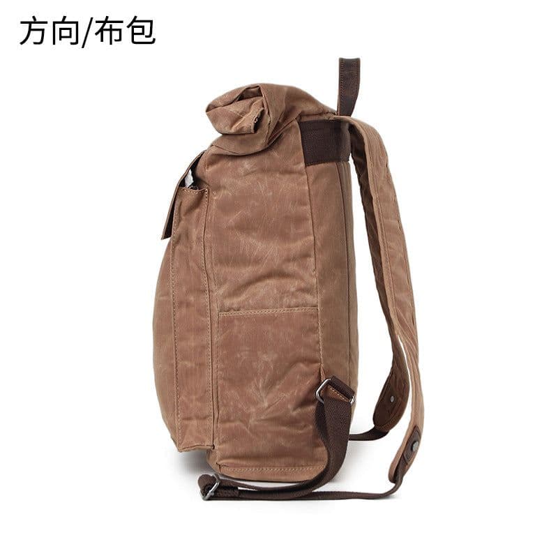 image-Direction Canvas Backpack Retro School Bag 36-55L
