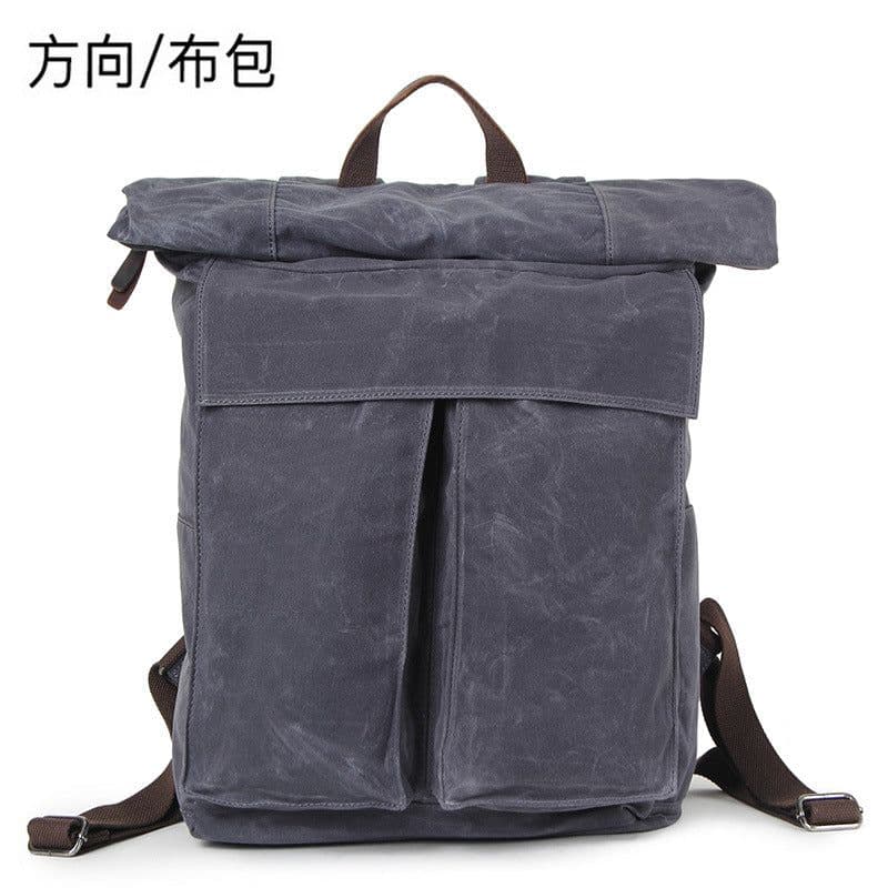 image-Direction Canvas Backpack Retro School Bag 36-55L