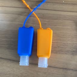 image-Cartoon Silicone Hand Sanitizer Bottle Holder with Cover