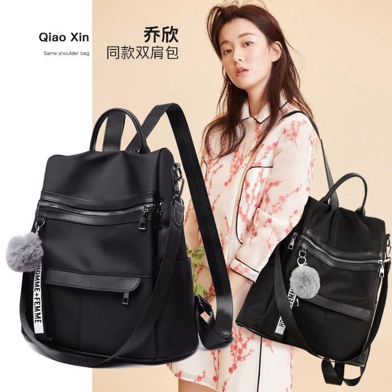 image-Women's Nylon Backpack with Pom Pom - Solid Color Commuter Bag