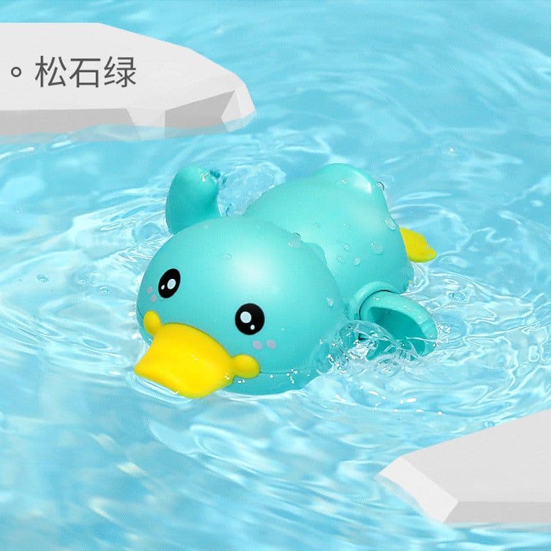 image-Wind-Up Swimming Duck Baby Bath Toy - Yellow Water Spray Duckling
