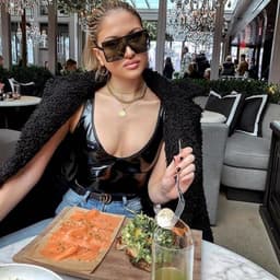 image-Women's Black PU Leather Bodysuit Shaping One-Piece Stretch Top