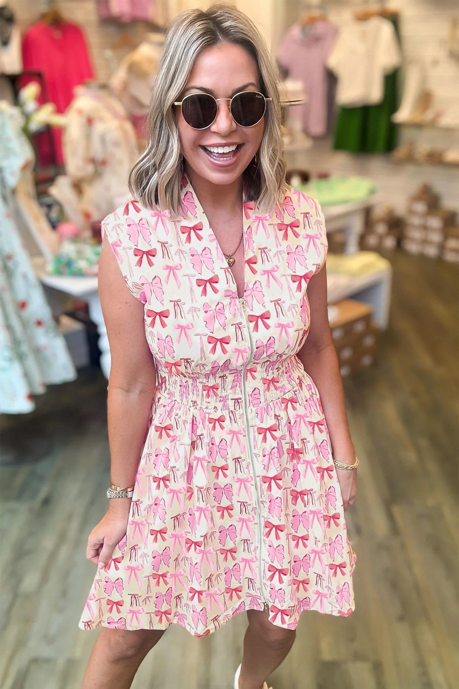 image-Pink Full Zip Cinched Waist Sleeveless Bow Mini Dress