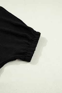 image-Black Dolman Half Sleeve Leopard Patchwork V Neck Blouse
