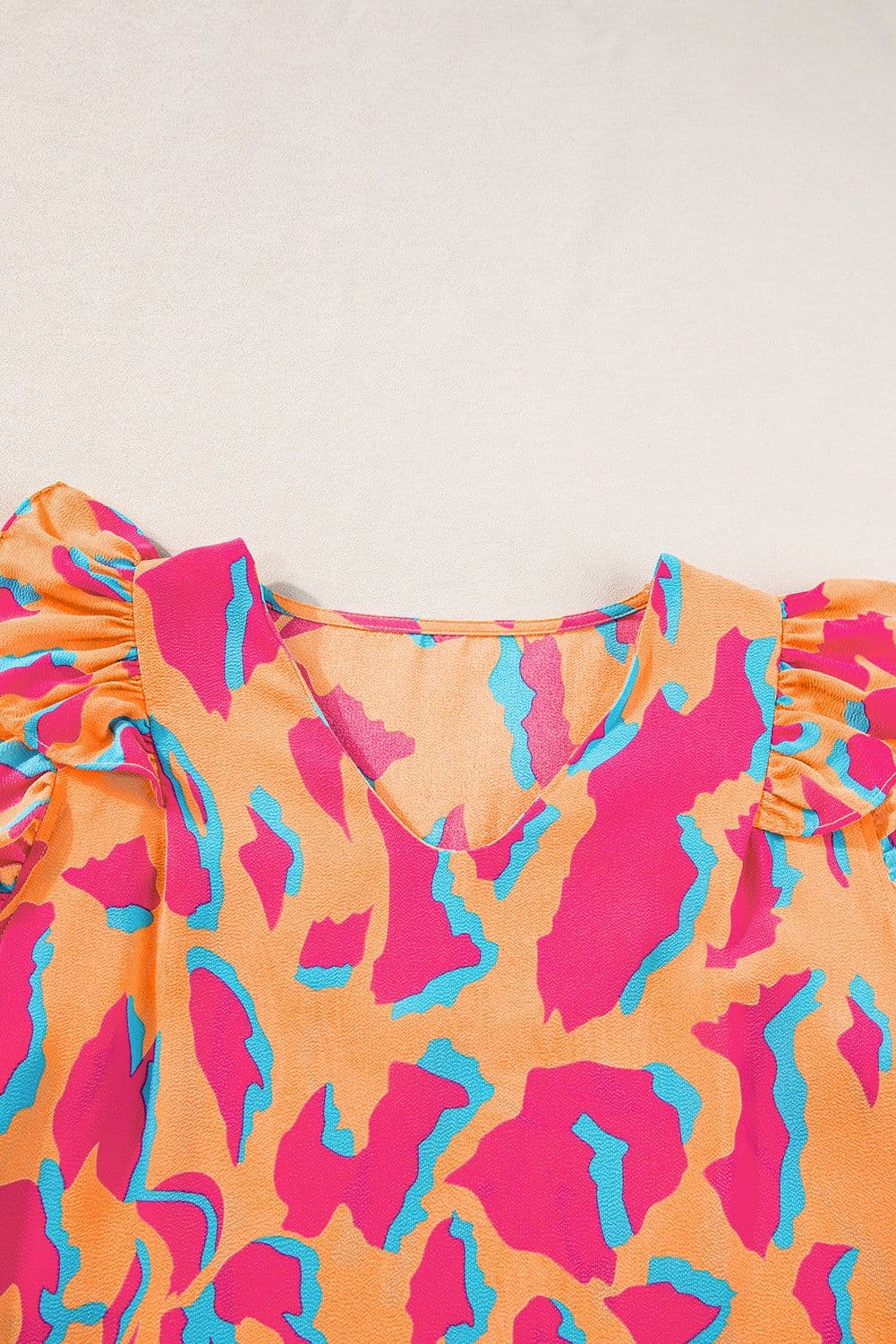 image-Abstract Print V-Neck Blouse - Orange Ruffled Sleeves