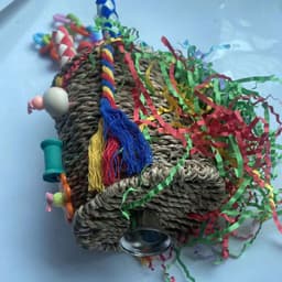 image-Large Parrot Halloween Shaped Chew Nut Colored Paper Grass Woven Puzzle Bird Toy