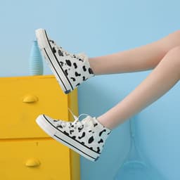 image-Hua Wusha Canvas High-Top Sneakers Cow Pattern Black White