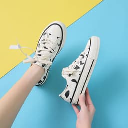 image-Hua Wusha Canvas High-Top Sneakers Cow Pattern Black White