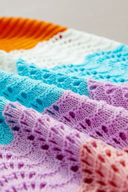 image-Multicolour Wavy Striped Knit Sleeveless Sweater