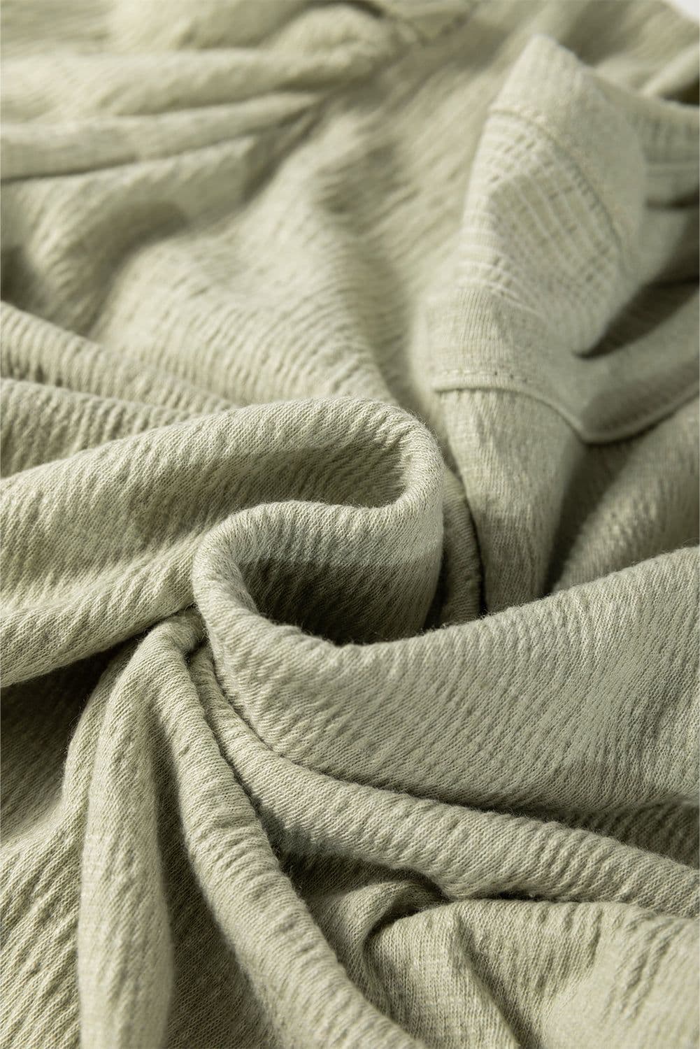 image-Laurel Green Textured Blouse - Round Neck Half Sleeve