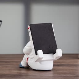 image-Simple Astronaut Mobile Phone Stand Student Desktop Holder Cute Spaceman Cell Phone Holder Creative Gift Small Desk Decoration
