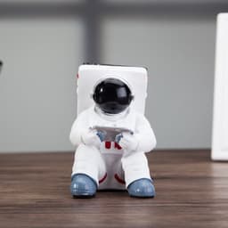 image-Simple Astronaut Mobile Phone Stand Student Desktop Holder Cute Spaceman Cell Phone Holder Creative Gift Small Desk Decoration