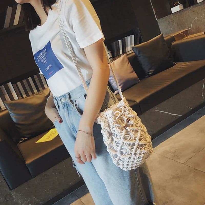 image-Women's Round Diagonal Cotton Crochet Tassel Small Bag