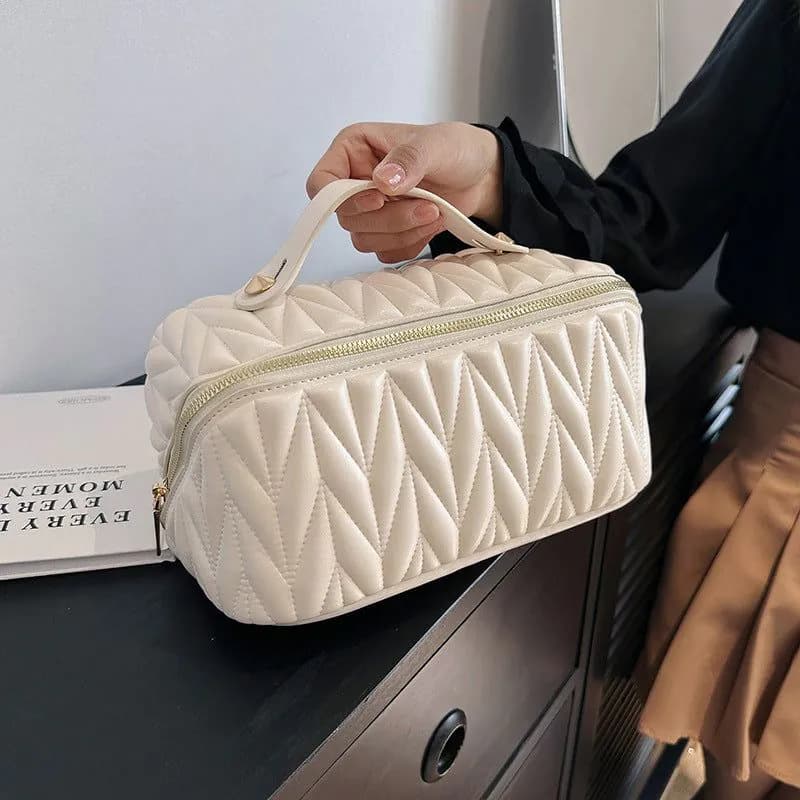 image-Portable High-grade Elastic Soft Surface Pillow Bag Travel Cosmetics Storage
