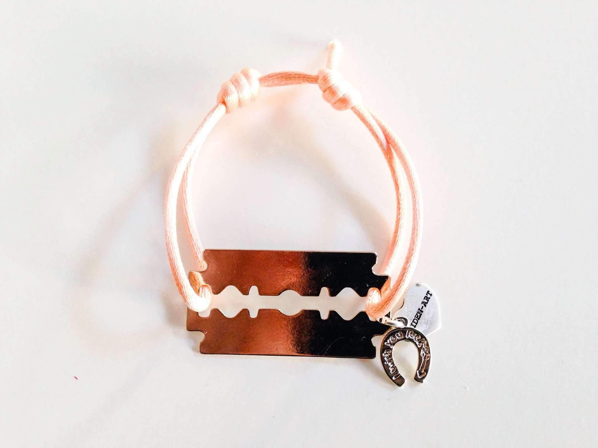 image-Colorful punk bracelet made with silk cord and silver plated Charms.