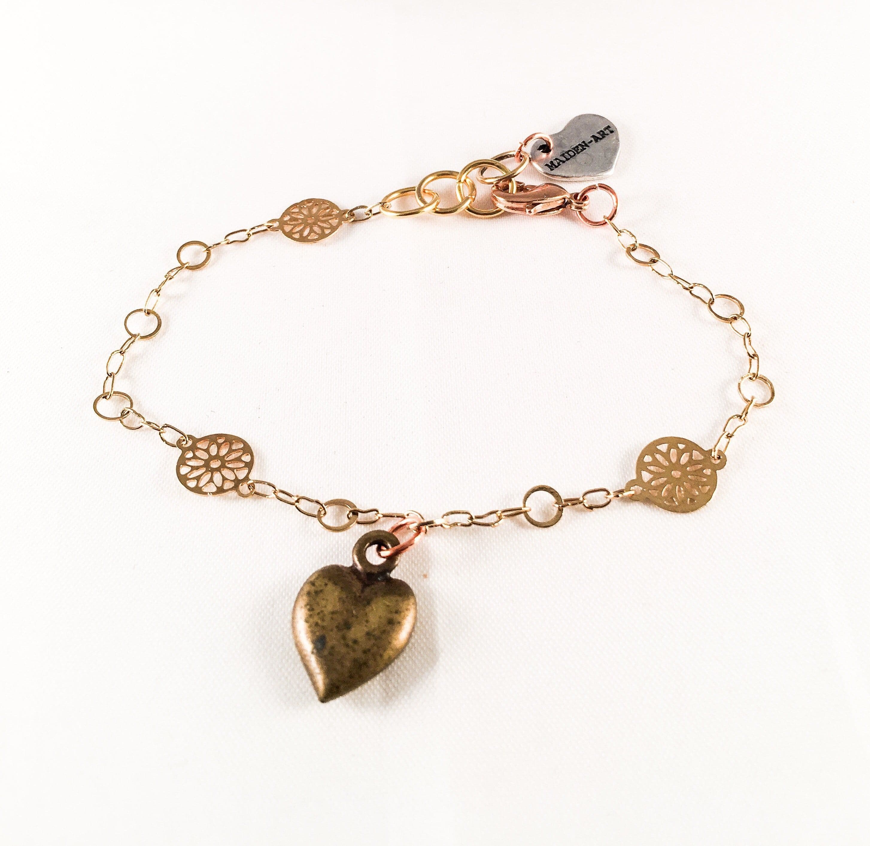 image-Bronze Heart Charm Bracelet and 18kt Gold Plated Flower Chain.