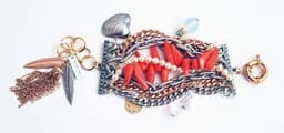image-Silver cuff bracelet with crystals, pearls, charms and natural coral.