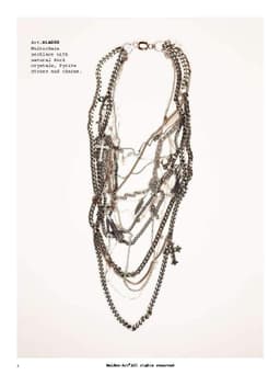 image-Multi strand necklace with silver and rose gold studded chains,