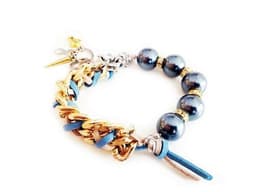 image-Handmade cuff bracelet with colorful pearls and suede ribbons.