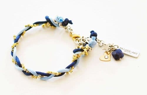 image-Charm bracelet with Lapis lazuli stones, crystals and silk cord.