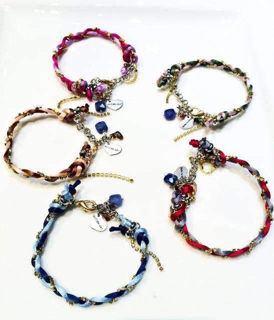 image-Charm bracelet with Lapis lazuli stones, crystals and silk cord.