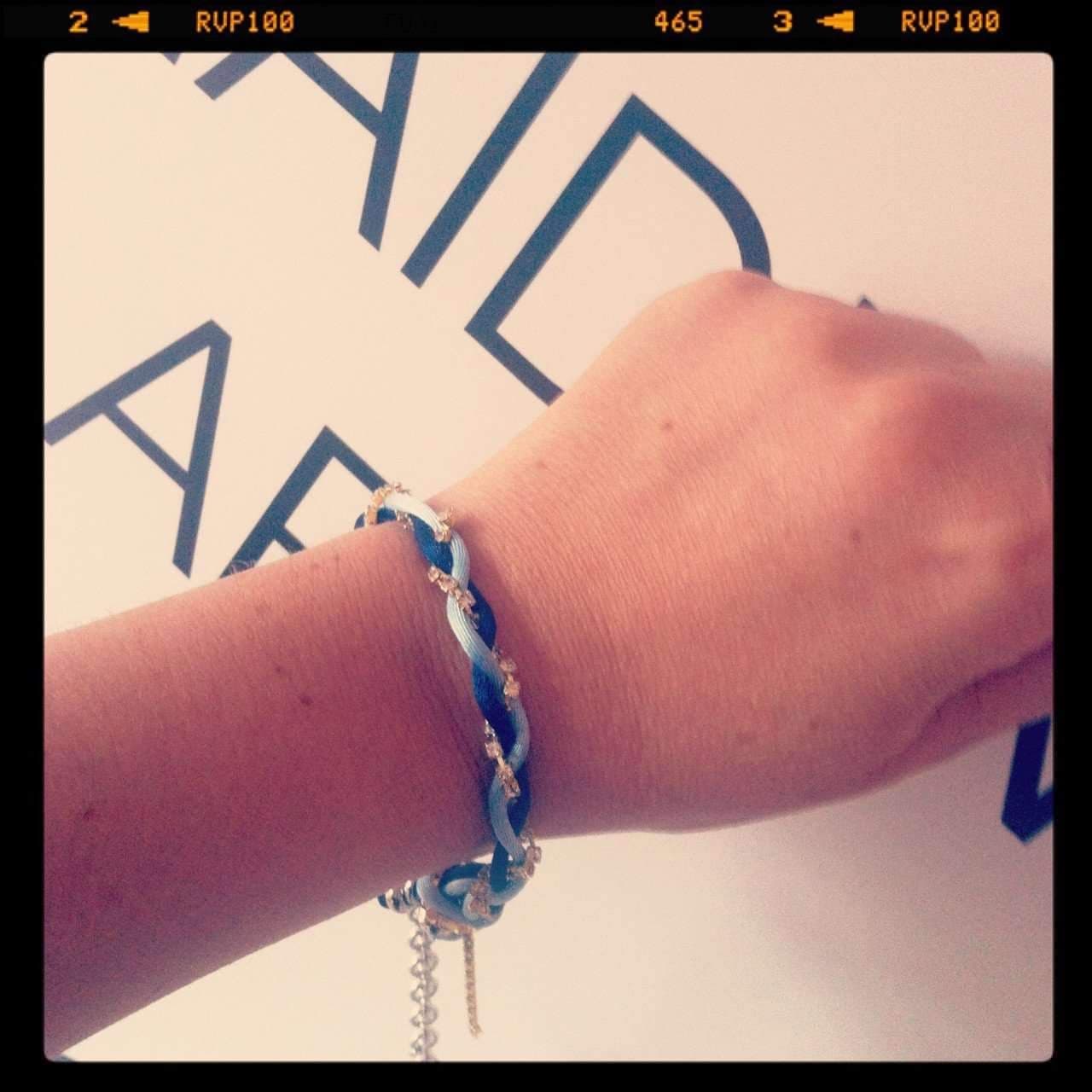 image-Charm bracelet with Lapis lazuli stones, crystals and silk cord.