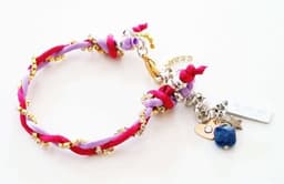 image-Charm bracelet with Lapis lazuli stones, crystals and silk cord.