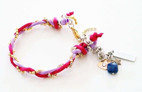 image-Charm bracelet with Lapis lazuli stones, crystals and silk cord.