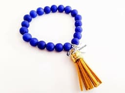 image-Colorful beaded bracelet with suede tassel. 5 Colors Available.