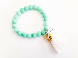 image-Colorful beaded bracelet with suede tassel. 5 Colors Available.