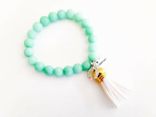 image-Colorful beaded bracelet with suede tassel. 5 Colors Available.