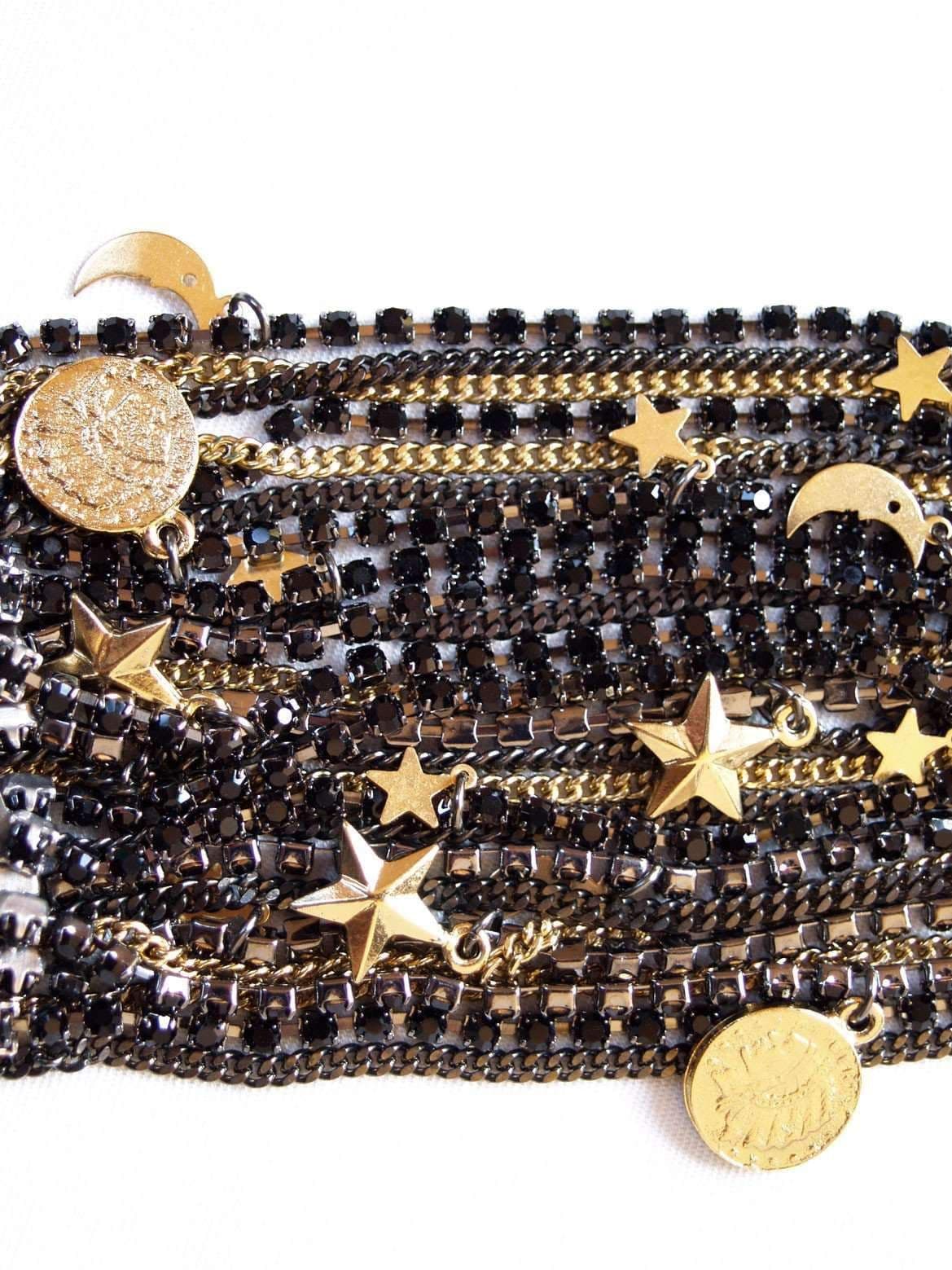 image-Black Ematite Jet Crystals Cuff Bracelet with 18kt Gold Plated Charms.