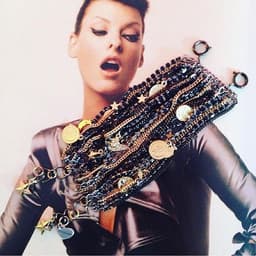 image-Black Ematite Jet Crystals Cuff Bracelet with 18kt Gold Plated Charms.