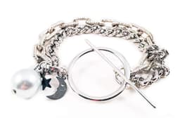 image-Silver bracelet with light blue pearl and black moon. Perfect for