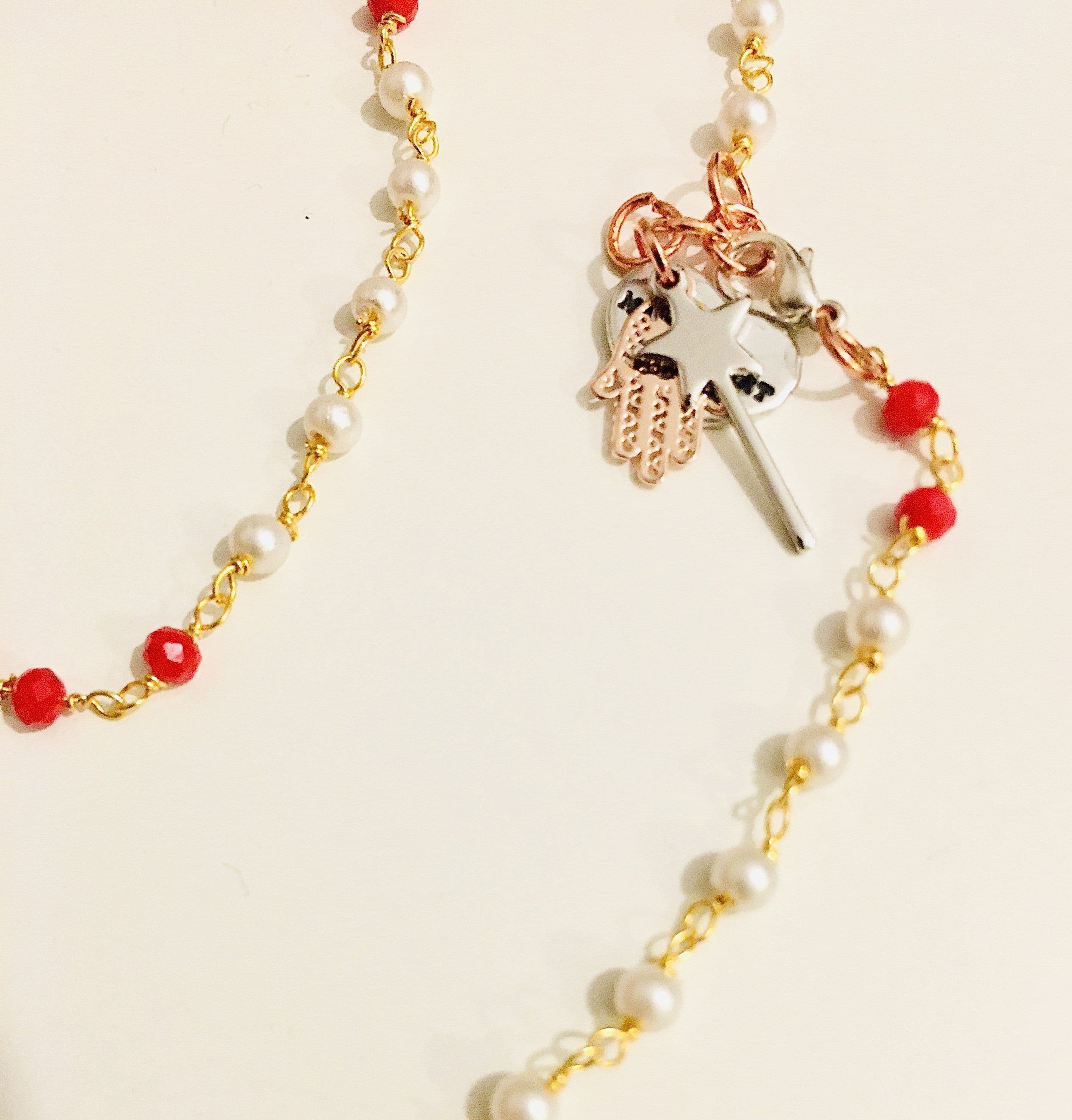 image-Rosary pearls and red crystals long necklace with magic wand and hamsa