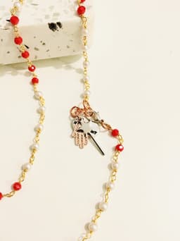 image-Rosary pearls and red crystals long necklace with magic wand and hamsa